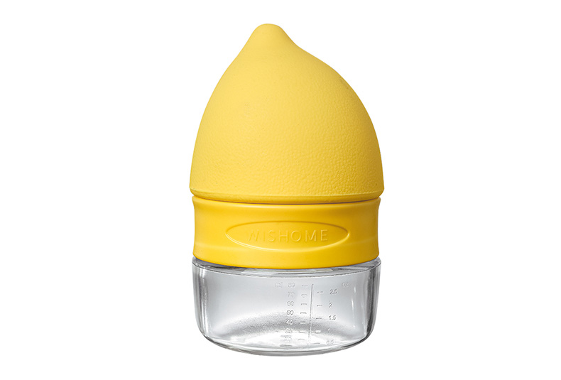 3-in-1 lemon squeezer in yellow with clear 80 ml measuring cup