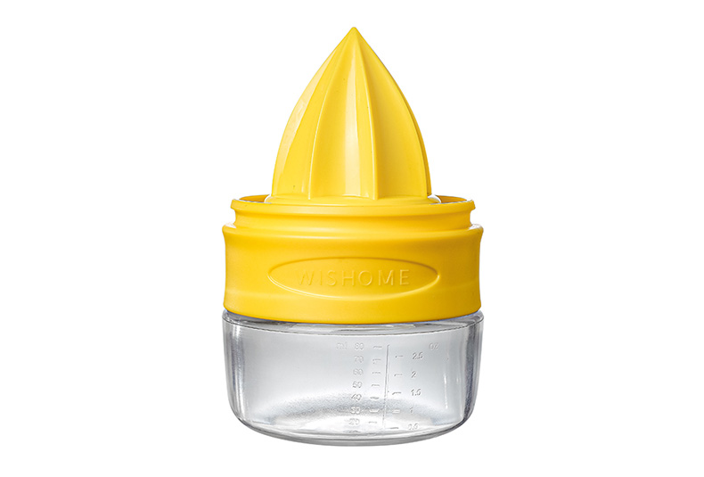3-in-1 lemon squeezer in yellow with clear 80 ml measuring cup