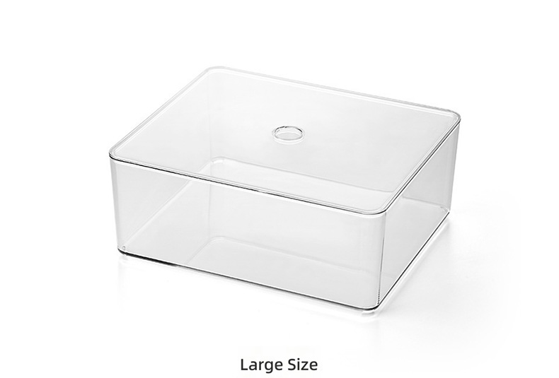 Drawer storage box set organizing clothes inside a dresser drawer