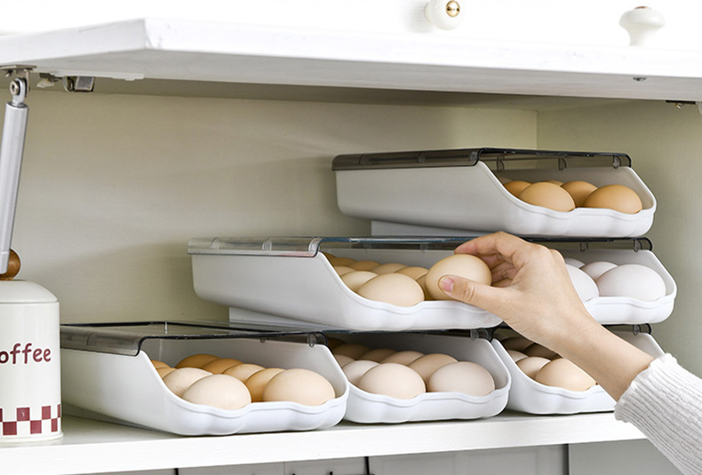 Stackable egg storage box with secure slots for fridge organization