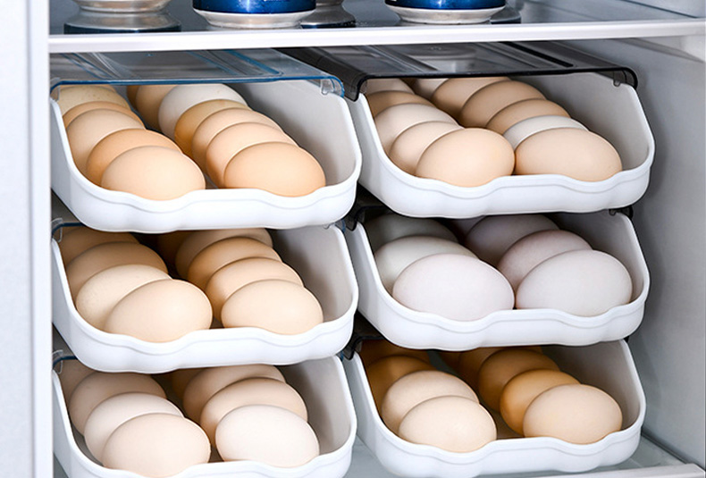 Stackable egg storage box with secure slots for fridge organization