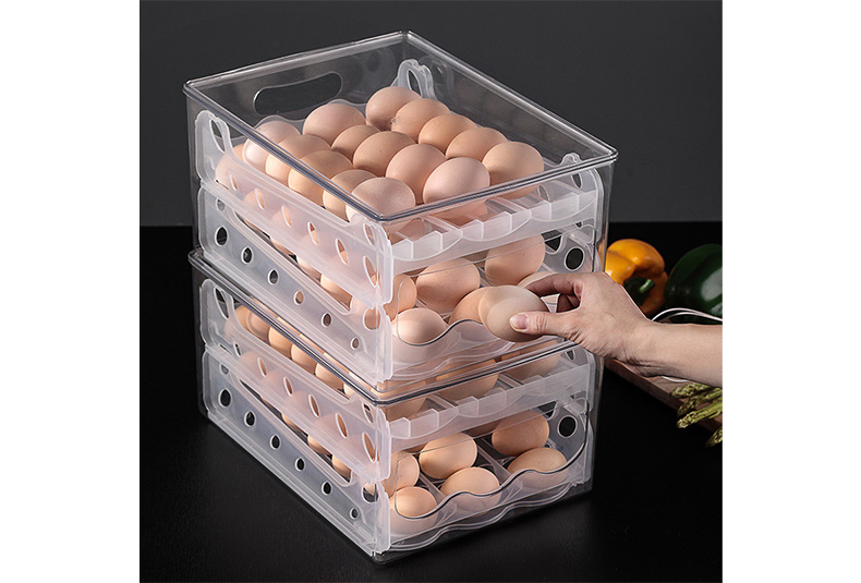 Stackable egg storage box with secure slots for fridge organization