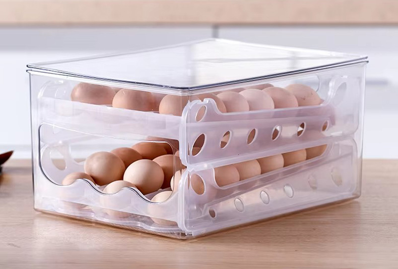 Stackable egg storage box with secure slots for fridge organization