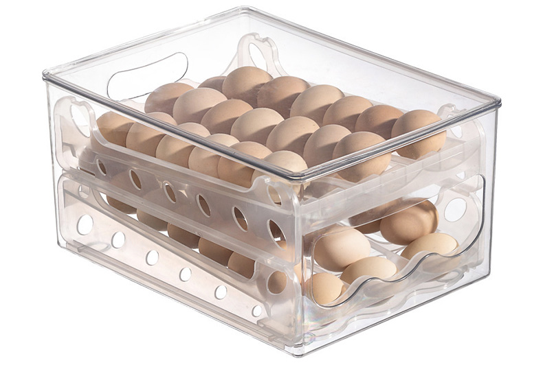 Stackable egg storage box with secure slots for fridge organization